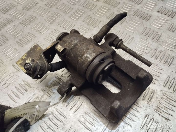 Суппорт задний левый Volkswagen Sharan 95-00