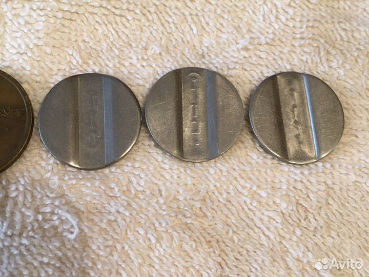 Жетоны метро и телефоные