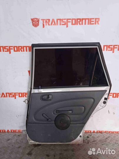 Стекло двери правое заднее Toyota Corolla EE103V