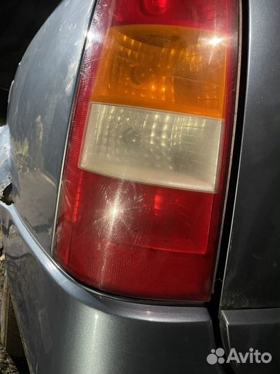 Фонарь левый Opel Astra G Универсал