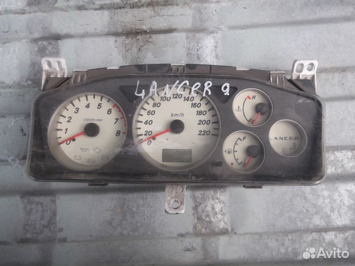 Панель приборов Mitsubishi Lancer