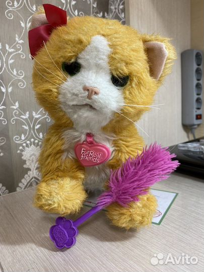 Игрушечная кошка