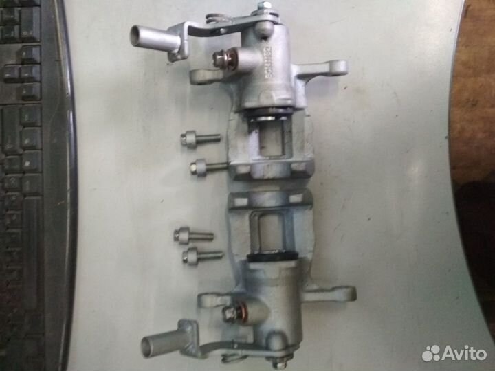 Задний суппорт ручник стояночный тормоз Ssangyong