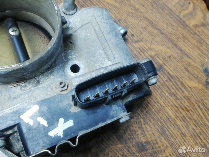 Дроссельная заслонка Митсубиси Лансер 10