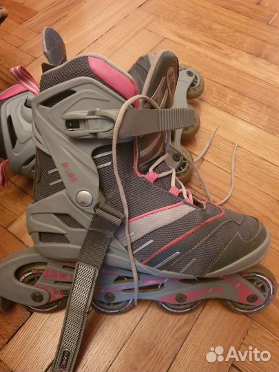 Роликовые коньки