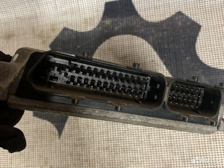 Блок управления двигателем Skoda 06A906018GA