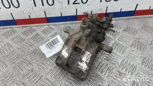 Суппорт тормозной задний левый nissan almera N16