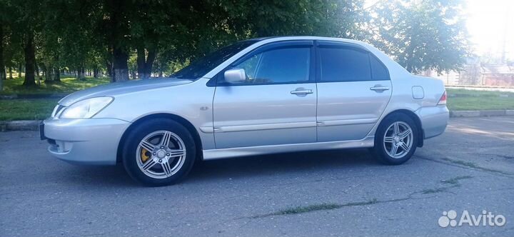 Mitsubishi Lancer 1.6 МТ, 2006, 294 335 км