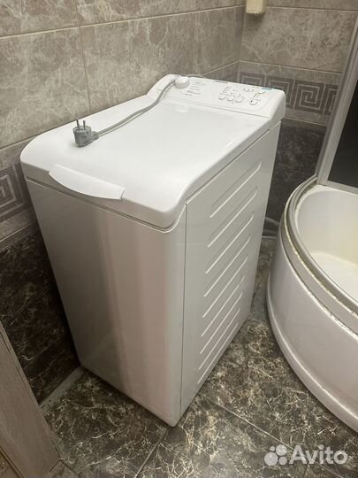 Стиральная машина с вертикальной загрузкой