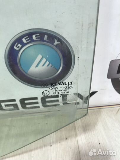 Стекло боковое двери Renault symbol Лев