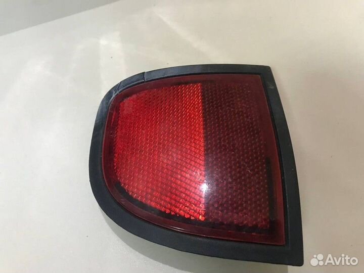 Светоотражатель в бампер задний левый