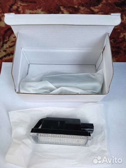 Фонарь подсветки номера megane 2