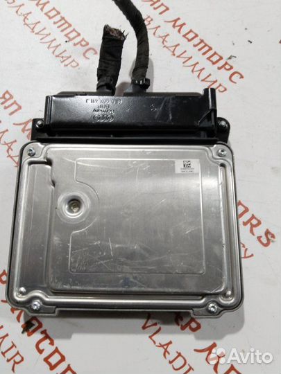 Блок управления двигателем Audi A3 8P caxa 1.4
