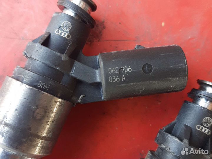 Форсунка топливная 2.0 TSI VW Passat B6