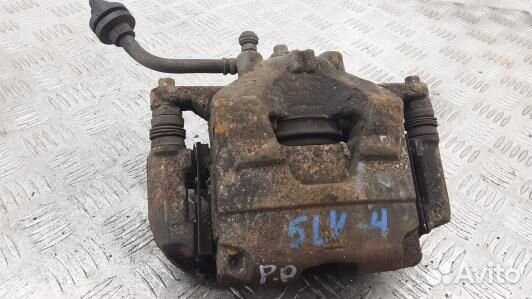 Суппорт тормозной передний правый opel astra J (5L