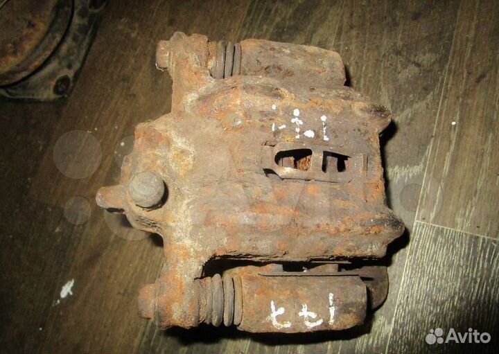 Суппорт тормозной задний Honda Shuttle 2000