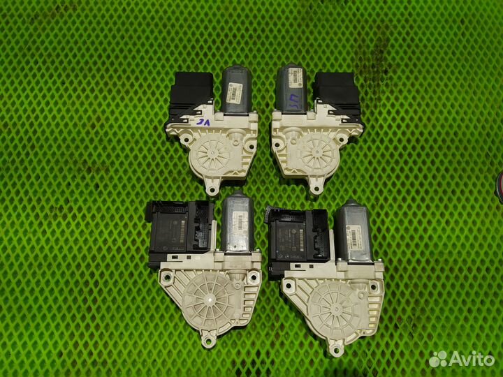 Моторчик стеклоподъемника левый перед VW Passat B6