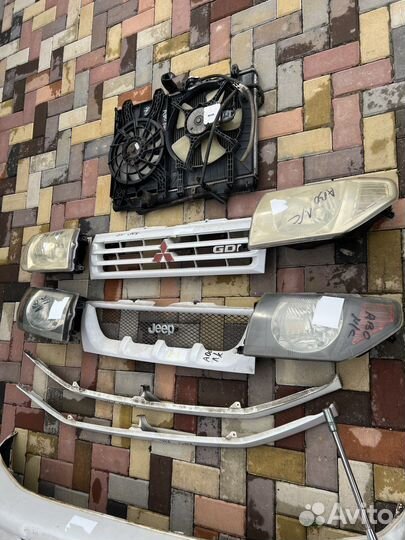 Бампер комплект pajero io pinin пинин