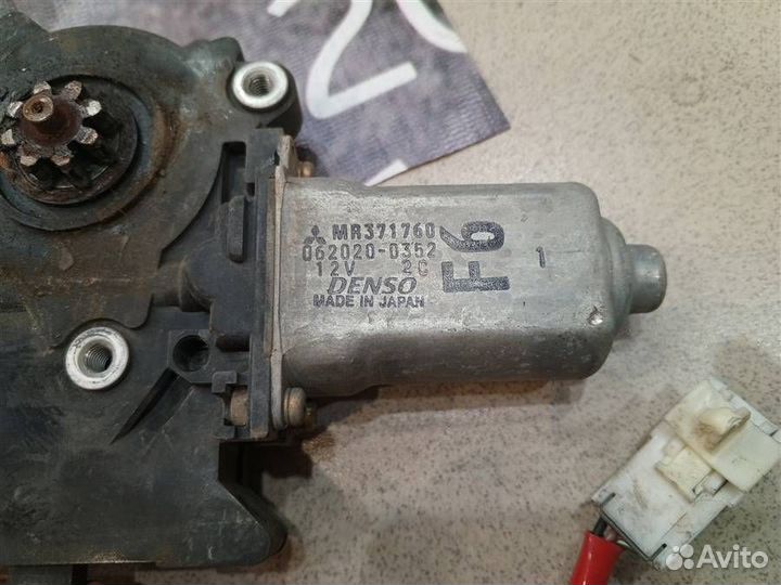 Моторчик стеклоподъемника передний правый Mitsubi