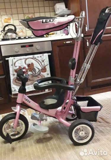 Трехколесный велосипед с ручкой