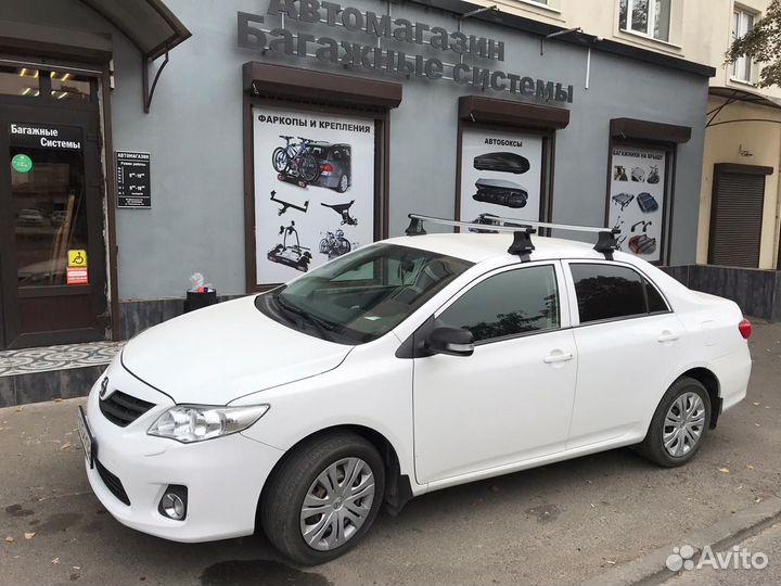 Багажник Атлант на крышу Toyota Corolla