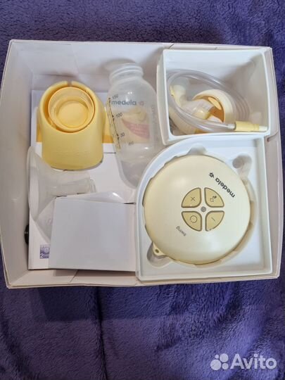 Молокоотсос medela swing электрический