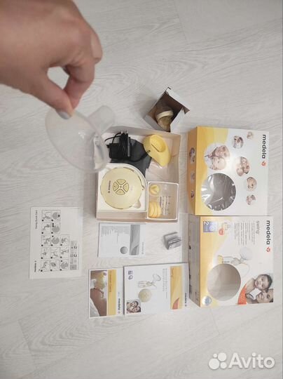 Молокоотсос medela swing электрический