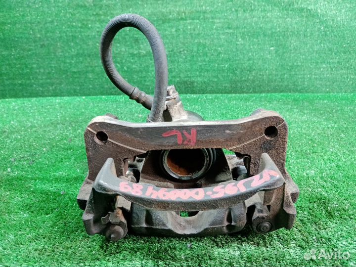 Суппорт тормозной задний левый Toyota Land Cruiser