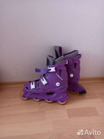 Роликовые коньки