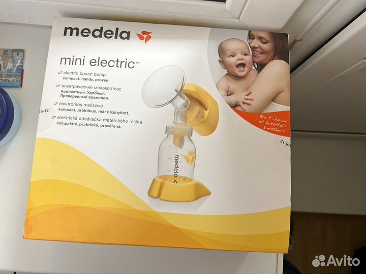 Молокоотсос medela электрический