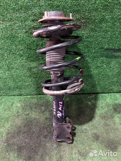 Стойка подвески передняя правая Nissan Liberty