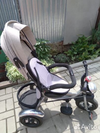 Велосипед-коляска с ручкой