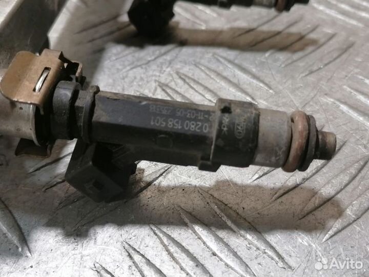 Форсунка двигателя Opel Corsa C