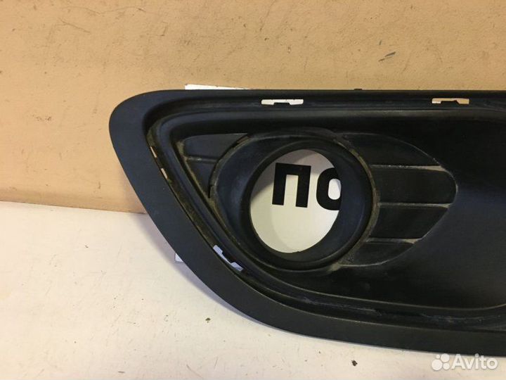 Заглушка бампера передняя левая Renault Logan 2