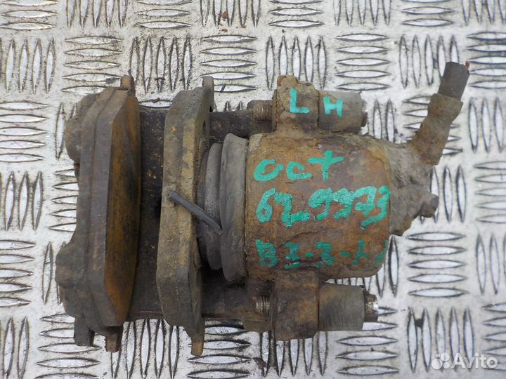 Суппорт тормозной передний левый Skoda Octavia 200