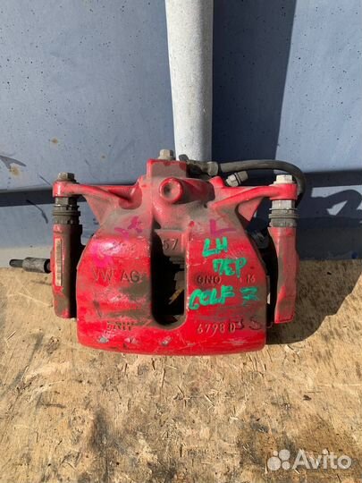 Суппорт тормозной передний левый Volkswagen Golf 7