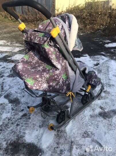 Зимняя детская коляска на полозьях с колесами