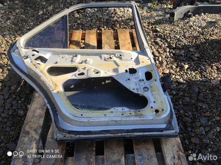 Дверь задняя левая Mercedes W202