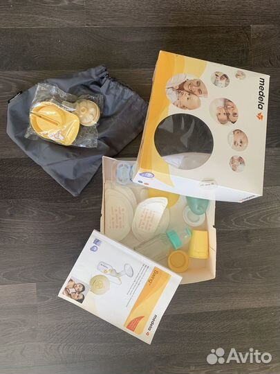 Молокоотсос Электрический medela swing