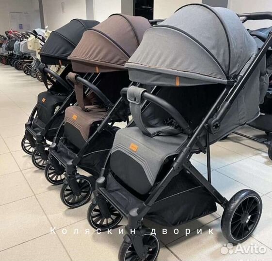 Коляска с большими колесами и перекидной ручкой