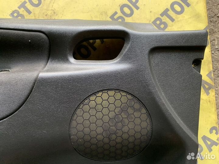 Обшивка двери передней левой Peugeot 207