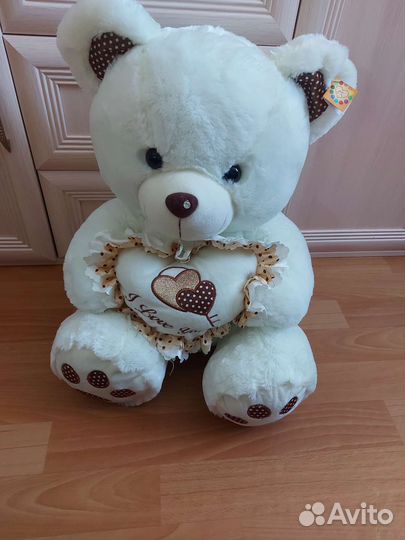 Медведь плюшевый