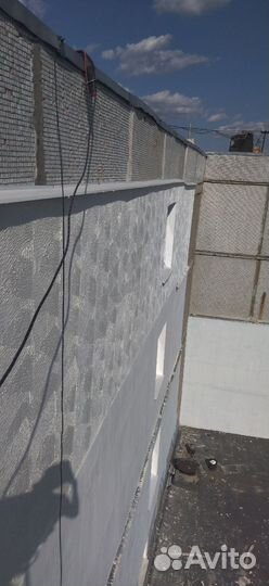 Промышленный альпинист, высотные работы, утепление