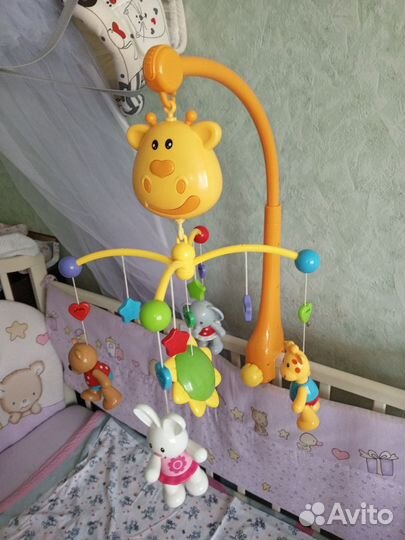 Детский мобиль в кроватку музыкальный