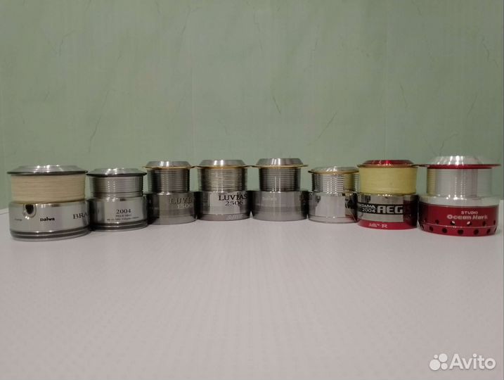 Шпули,много запчастей Daiwa