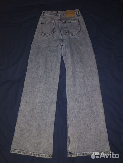 Джинсы клеш с высокой посадкой