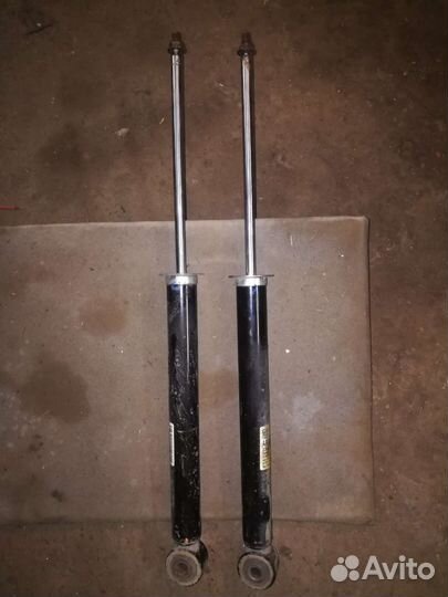 Стойки амортизаторы opel astra j задние