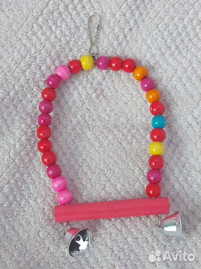 Игрушки для попугаев цветные