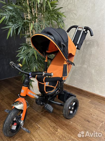 Трехколесный велосипед с ручкой