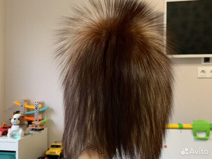 Женские меховые шапки